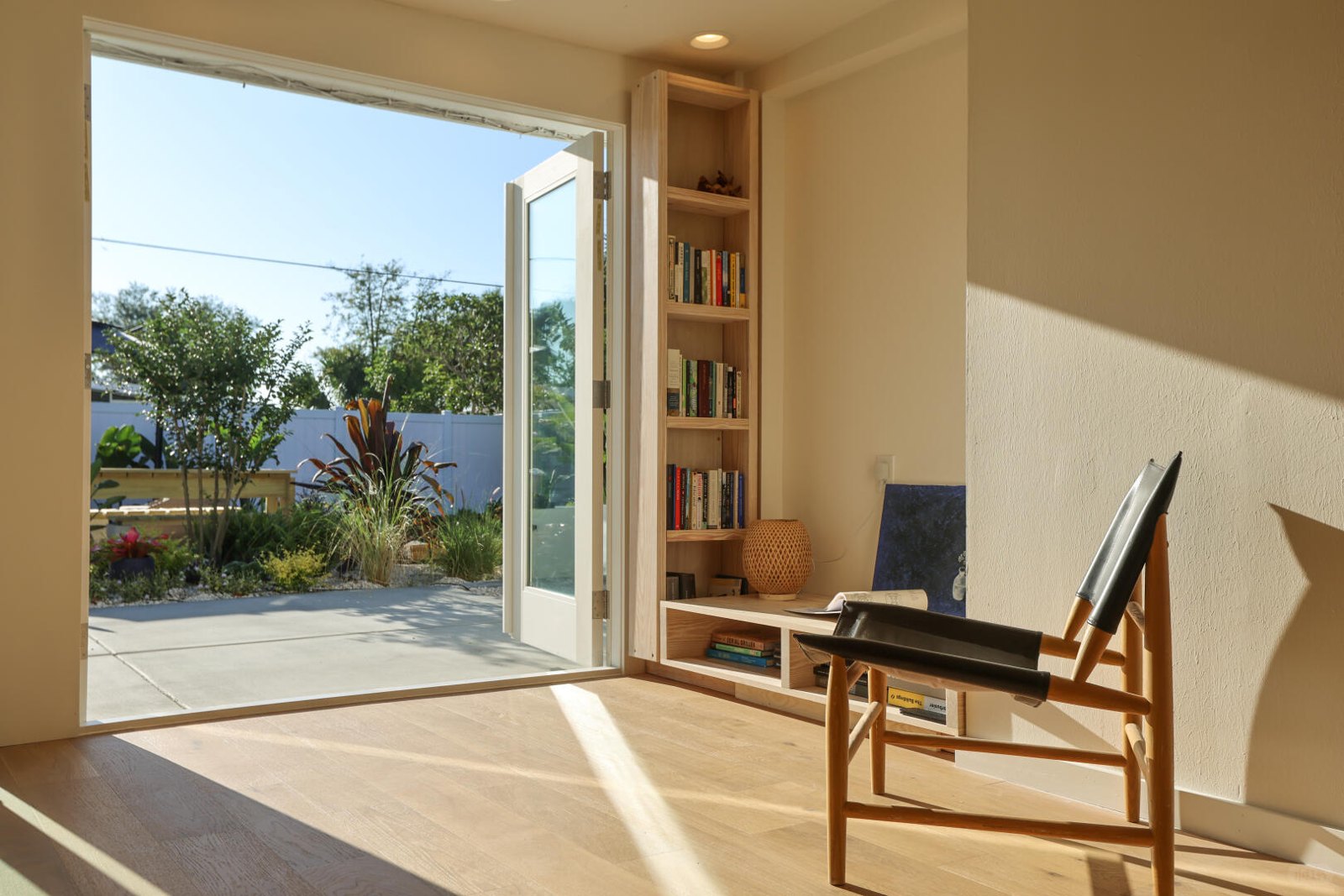 The office with its glass doors folded open